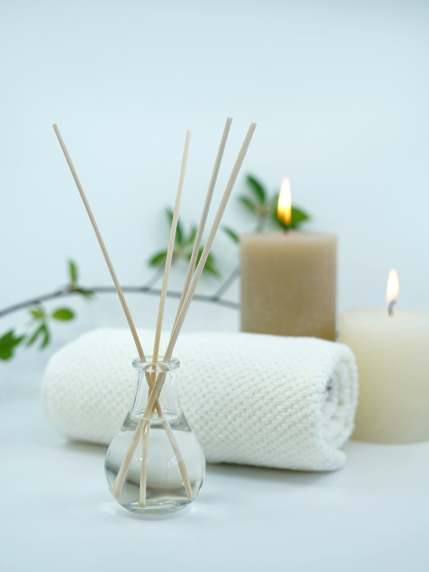 Ambiance du cabinet — bougies, serviettes et plantes zen